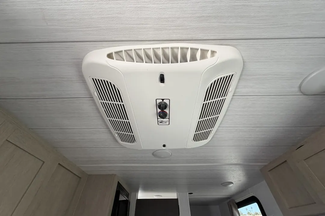 The ceiling air conditioner unit inside a 2024 Forest River Evo