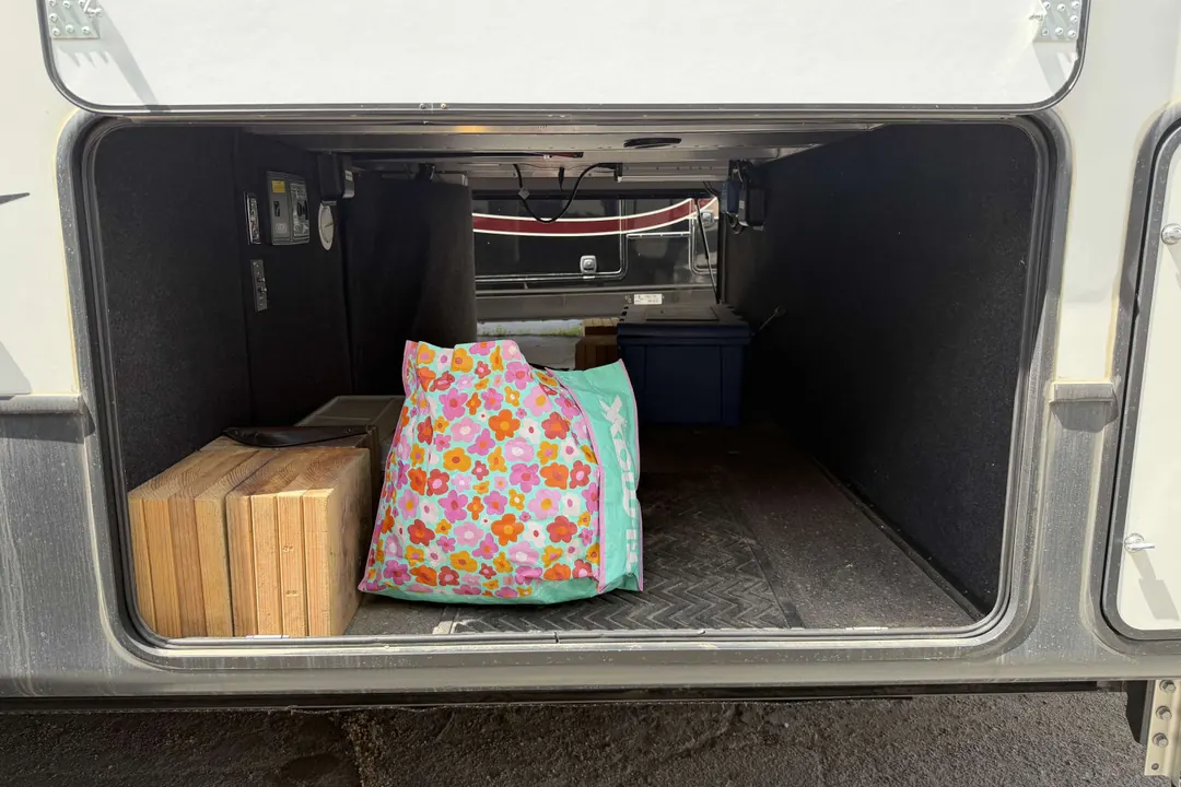 An open storage bay on a 2021 Keystone Montana fifth wheel