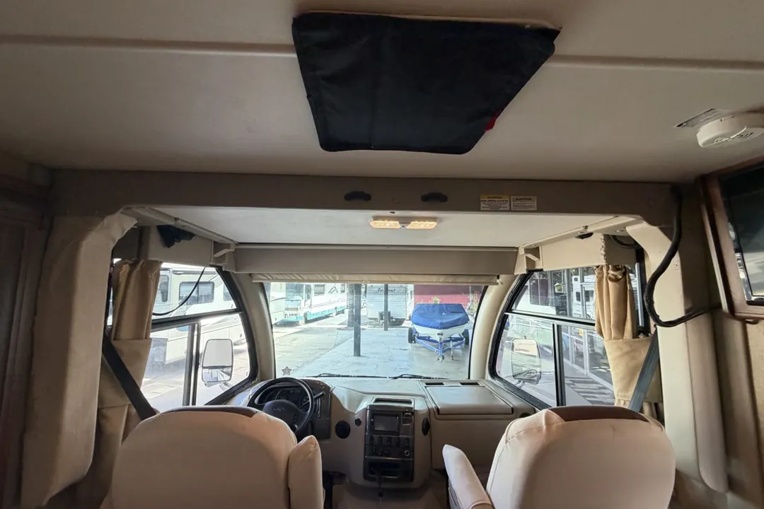 The cab and dash of a 2015 Thor Vegas