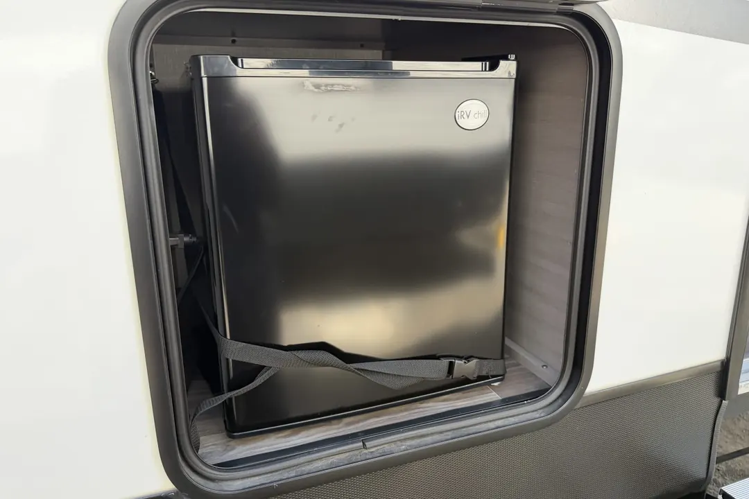 An open exterior access door on a 2024 Starcraft Super Lite