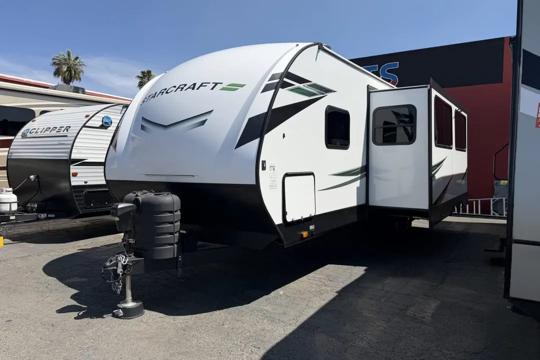 A 2024 Starcraft Super Lite travel trailer parked on a lot